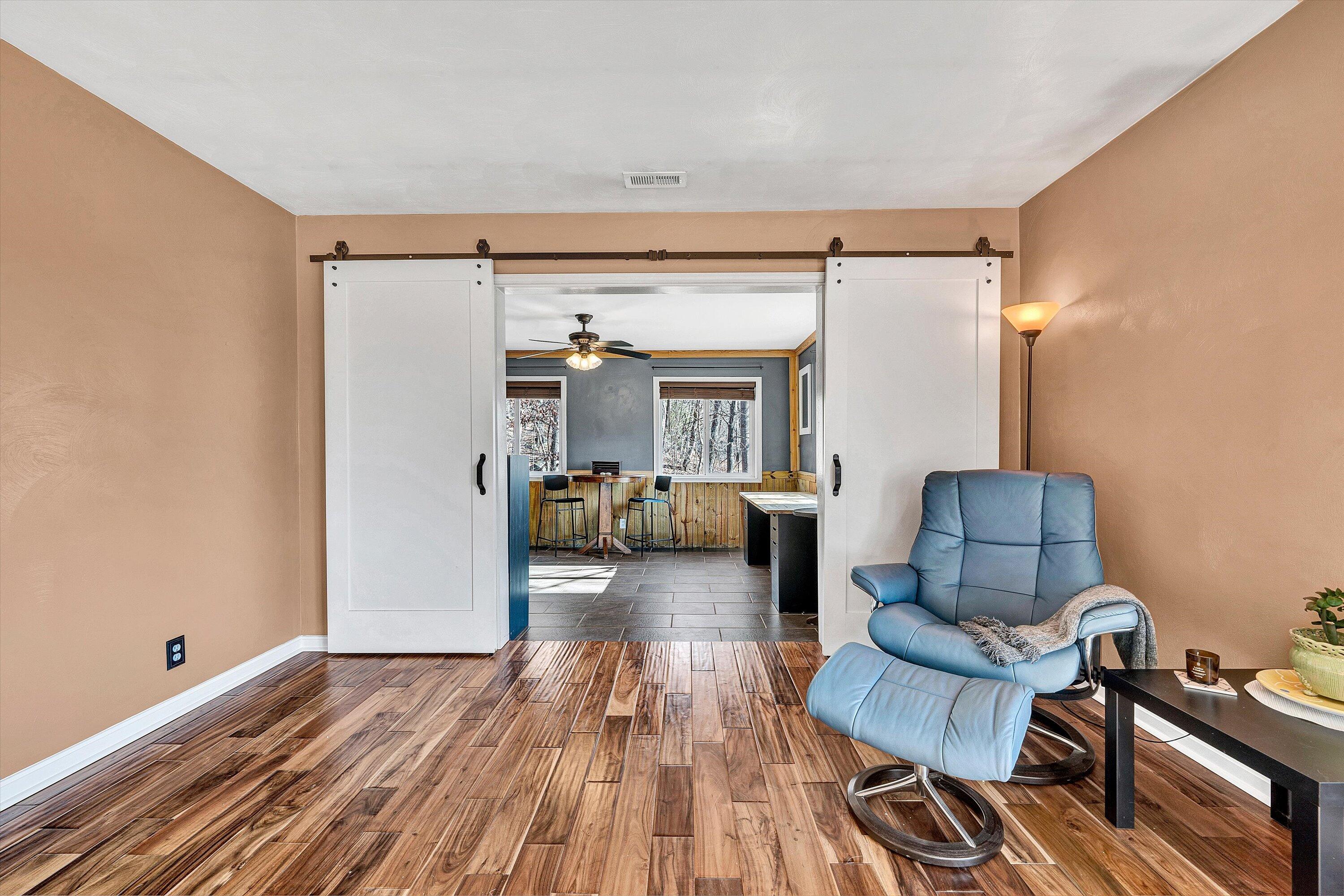 1311 Walnut Shell Drive Vinton, VA 24179 - Photo 12 of 61 a living room with furniture and a wooden floor
