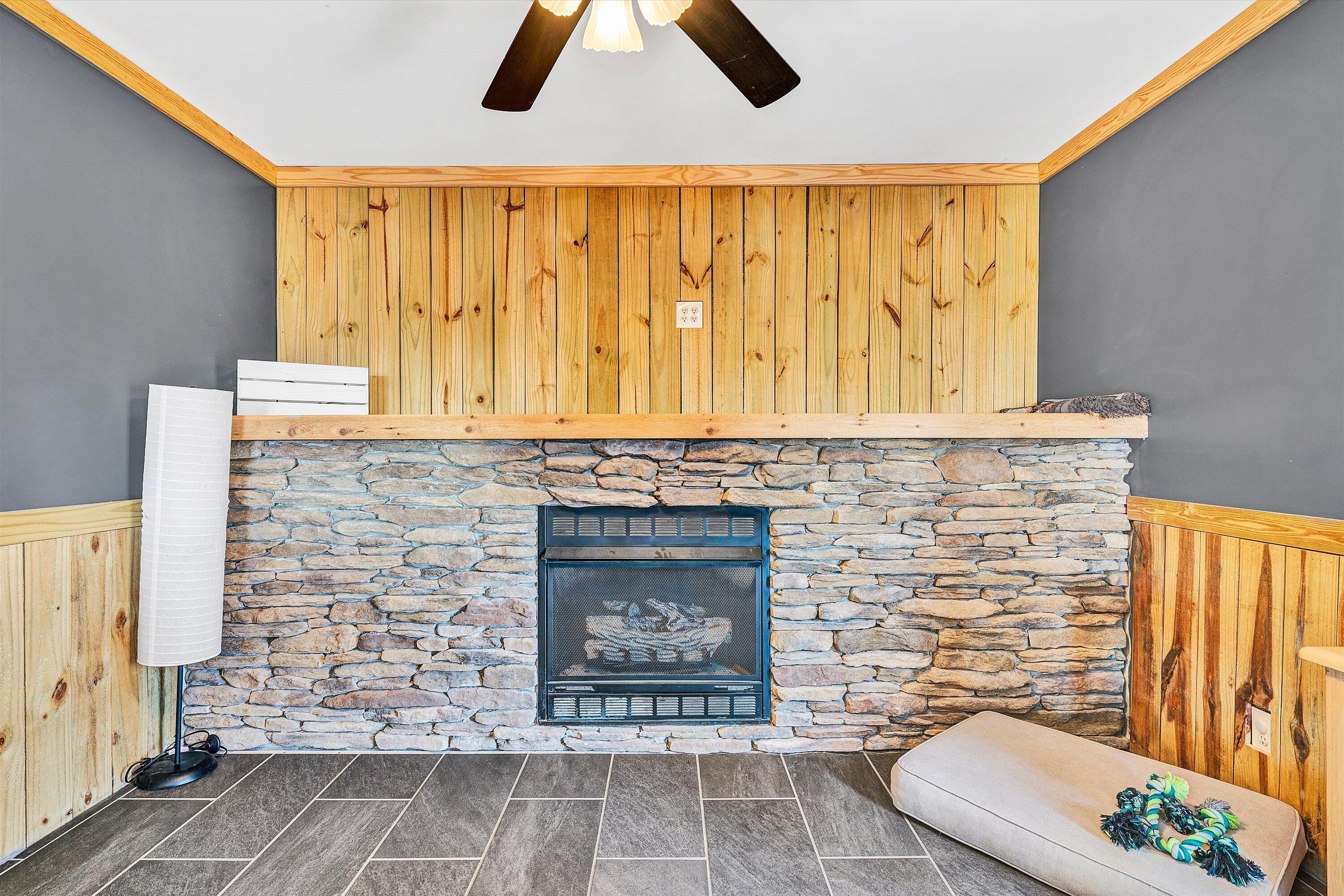 1311 Walnut Shell Drive Vinton, VA 24179 - Photo 16 of 61 a living room with furniture and a fireplace