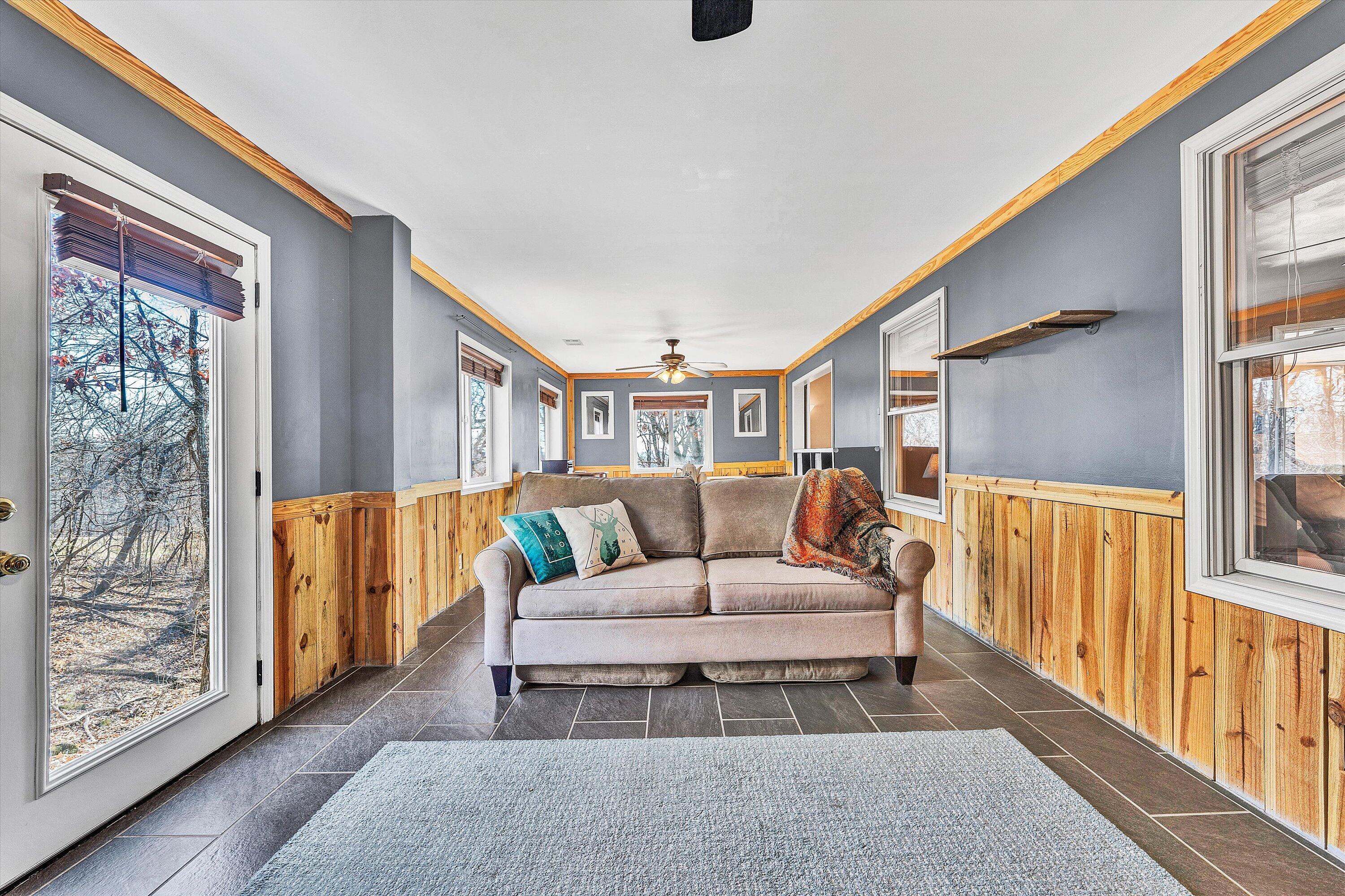 1311 Walnut Shell Drive Vinton, VA 24179 - Photo 17 of 61 a living room with furniture and a large window