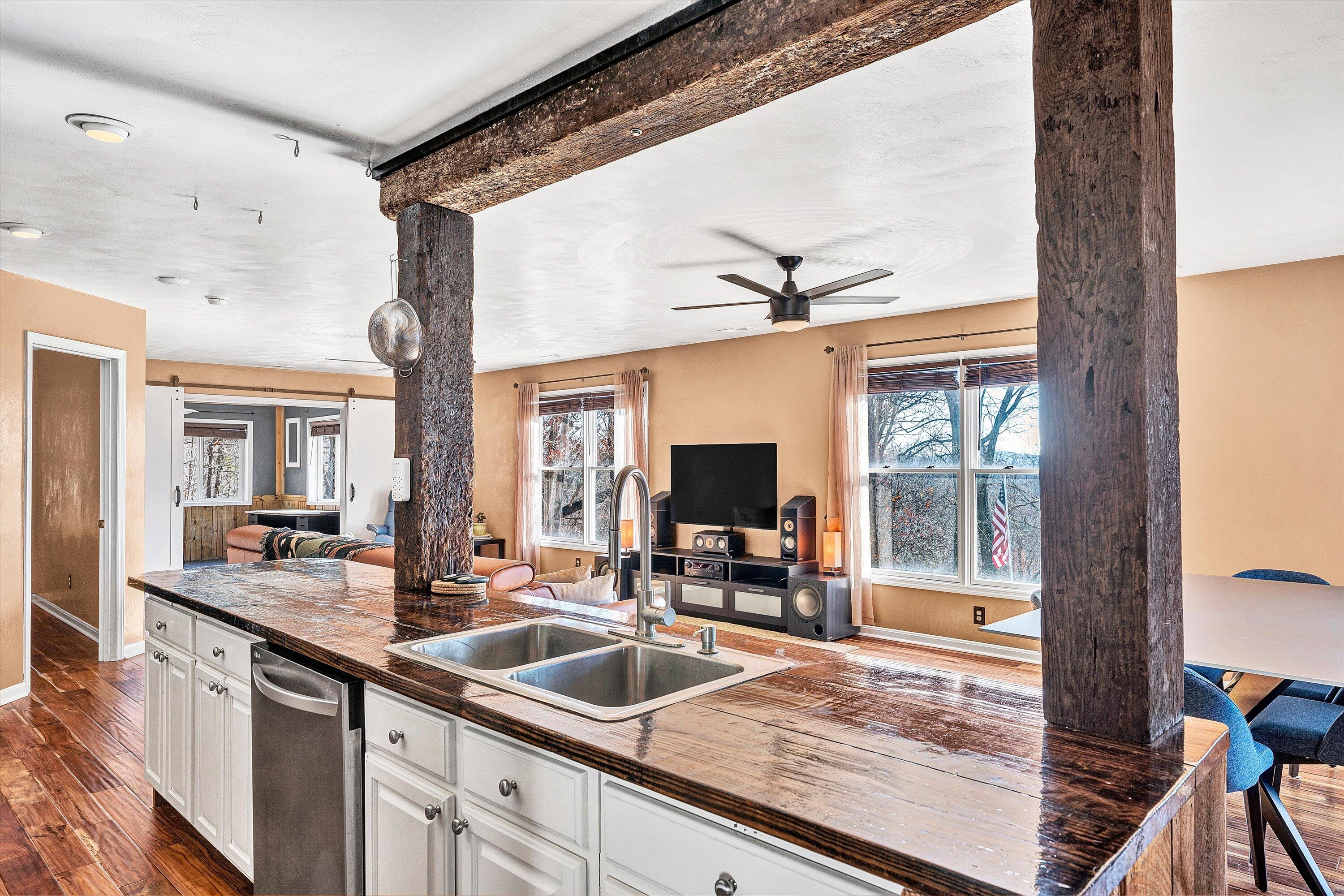 1311 Walnut Shell Drive Vinton, VA 24179 - Photo 20 of 61 a view of living room with granite countertop furniture and a flat screen tv