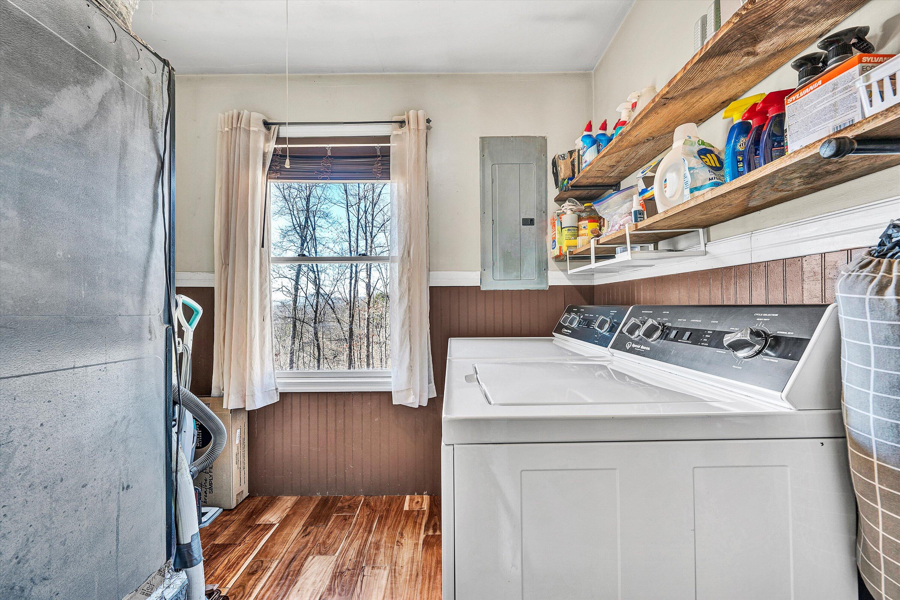 1311 Walnut Shell Drive Vinton, VA 24179 - Photo 27 of 61 a view of washer and dryer with kitchen in the background