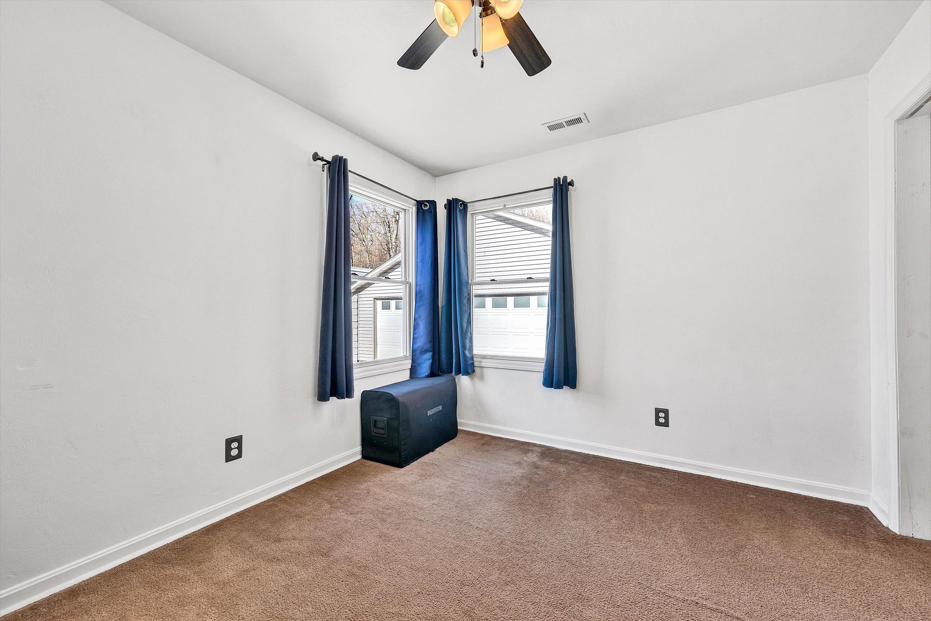 1311 Walnut Shell Drive Vinton, VA 24179 - Photo 28 of 61 an empty room with chandelier fan