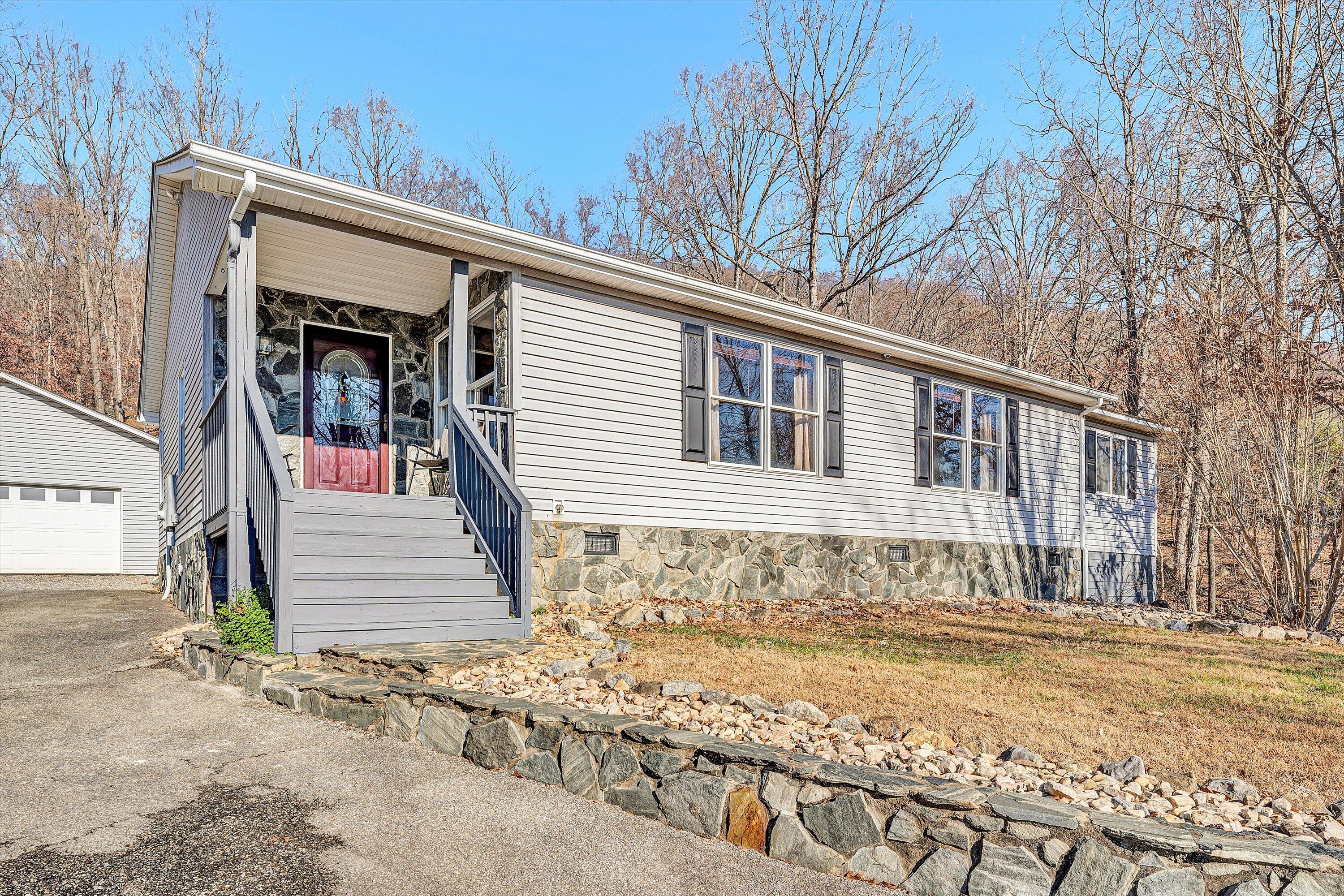 1311 Walnut Shell Drive Vinton, VA 24179 - Photo 3 of 61 a view of a house with a snow on the road