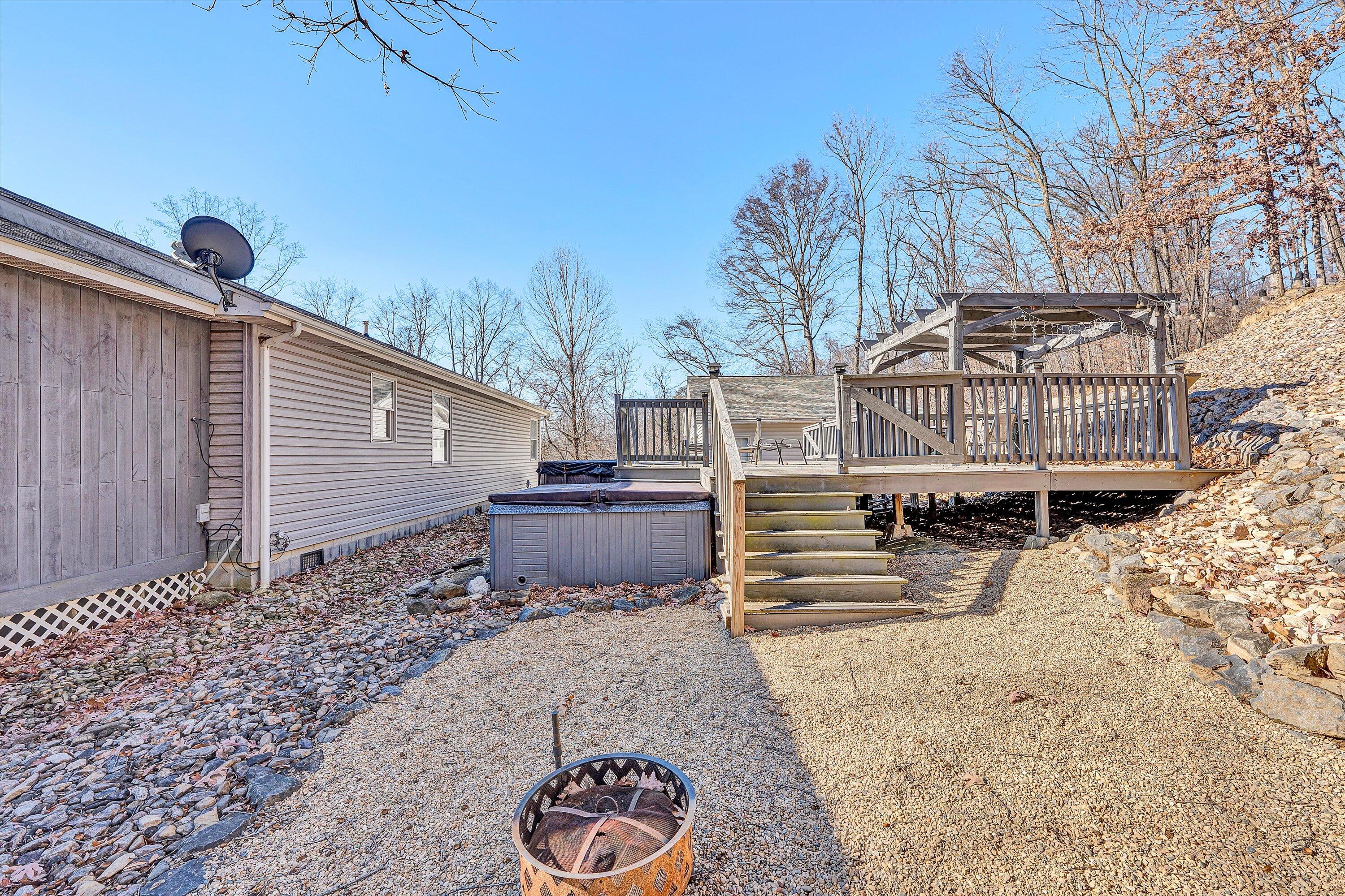 1311 Walnut Shell Drive Vinton, VA 24179 - Photo 34 of 61 a view of a backyard with sitting area