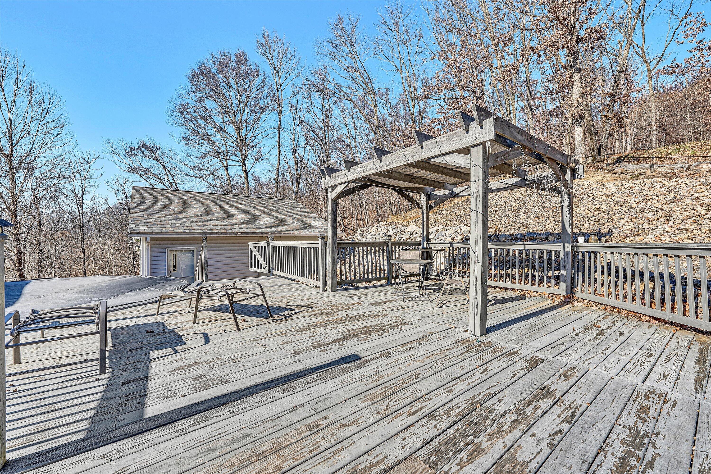 1311 Walnut Shell Drive Vinton, VA 24179 - Photo 37 of 61 a view of a roof deck with wooden floor and fence
