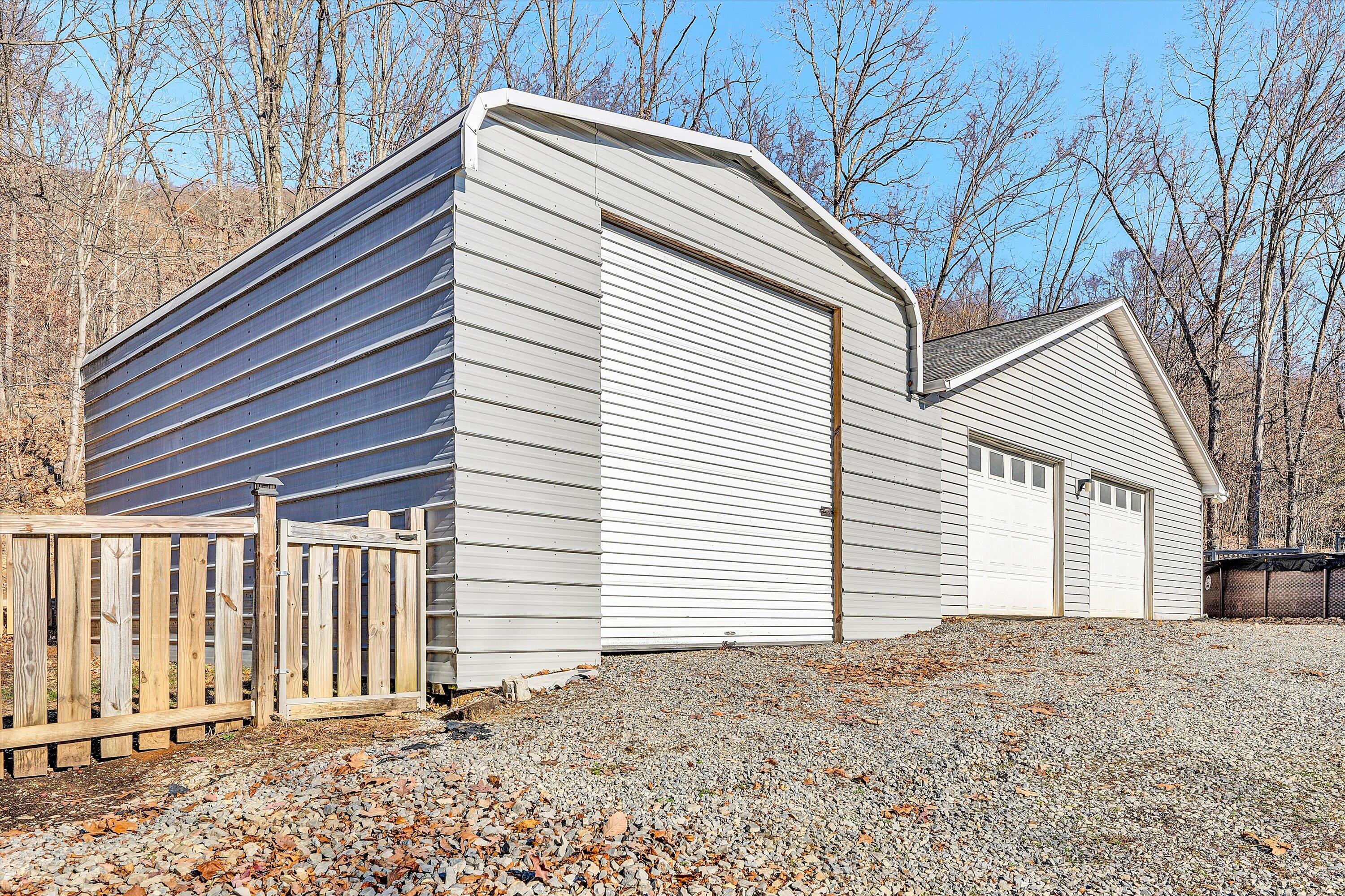 1311 Walnut Shell Drive Vinton, VA 24179 - Photo 44 of 61 a view of a house with a backyard