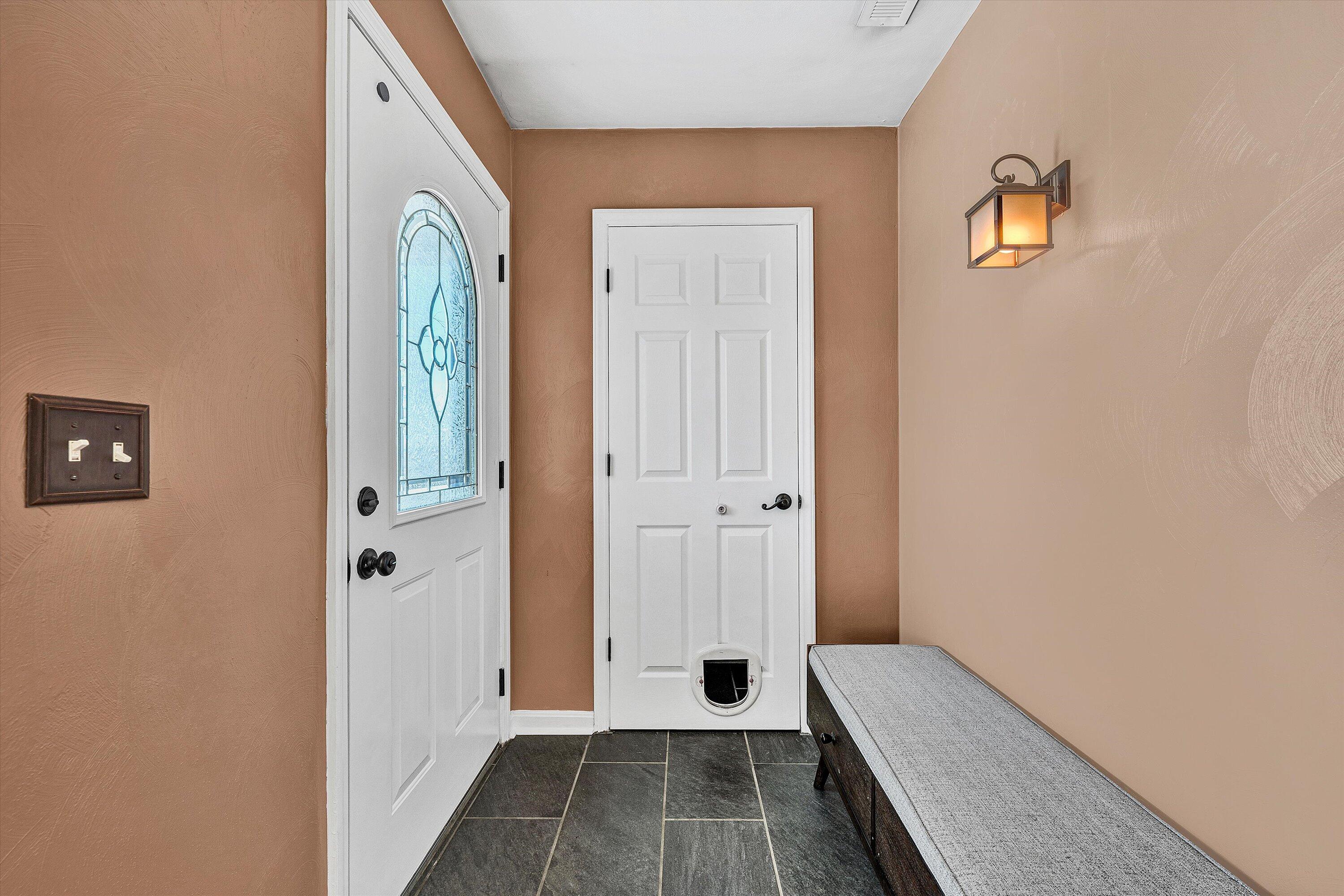 1311 Walnut Shell Drive Vinton, VA 24179 - Photo 6 of 61 a view of a bedroom with bed and hallway