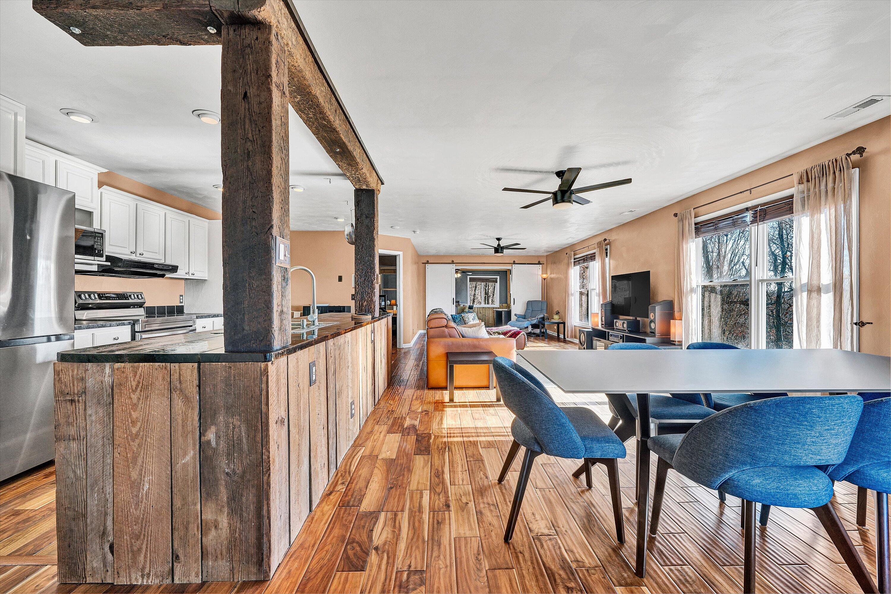 1311 Walnut Shell Drive Vinton, VA 24179 - Photo 61 of 61 a view of a dining room with furniture window and wooden floor