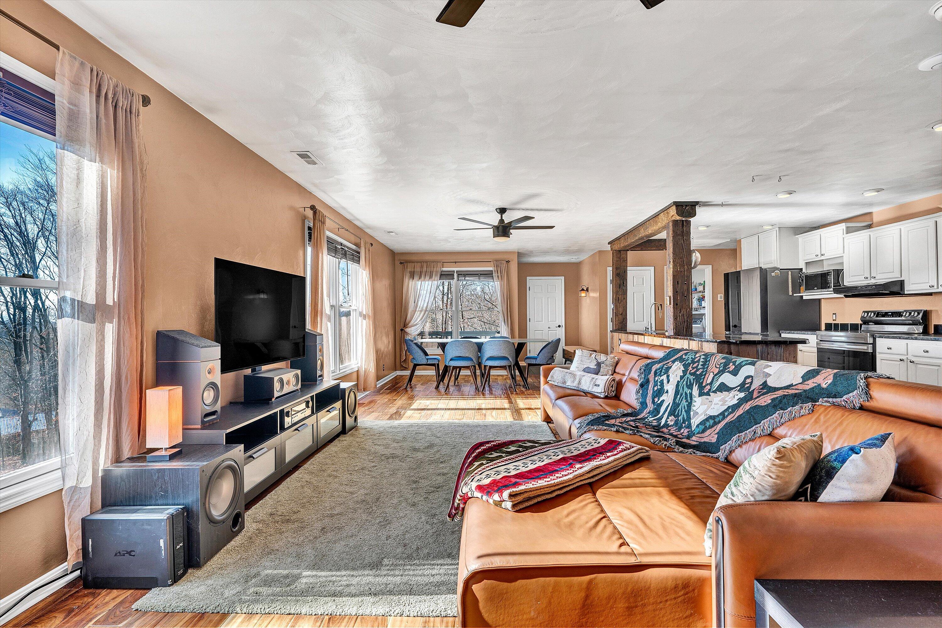 1311 Walnut Shell Drive Vinton, VA 24179 - Photo 8 of 61 a view of a livingroom with furniture and a flat screen tv