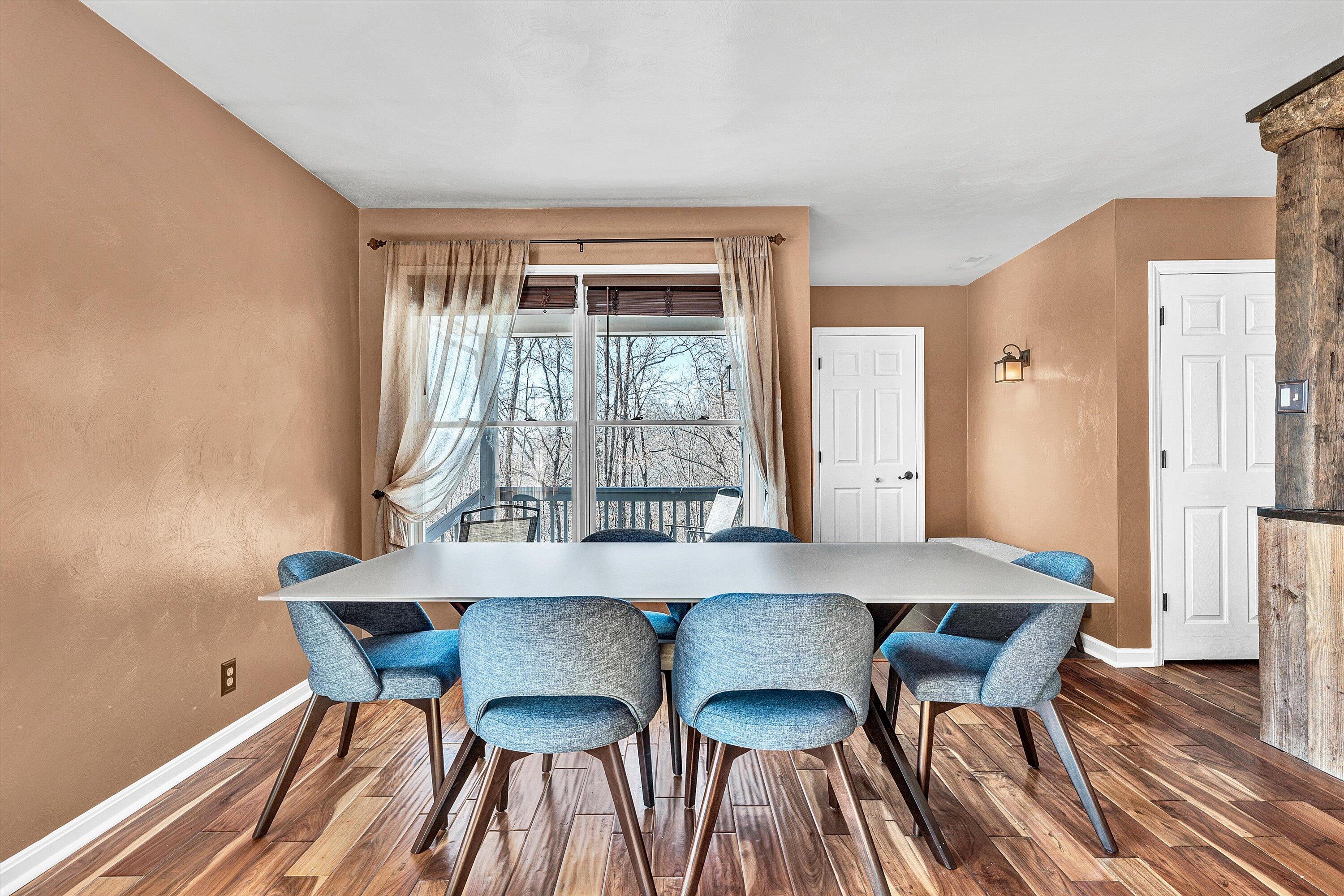 1311 Walnut Shell Drive Vinton, VA 24179 - Photo 9 of 61 a view of a dining room with furniture and wooden floor