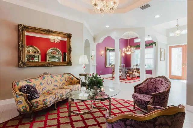 a kitchen with stainless steel appliances granite countertop a stove refrigerator sink and cabinets