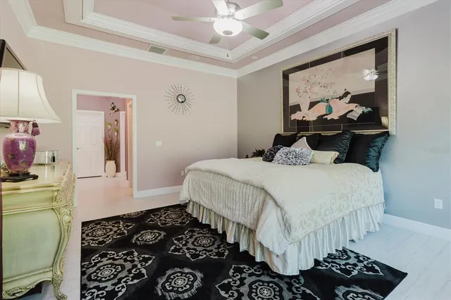 a bathroom with a granite countertop sink a mirror and a shower