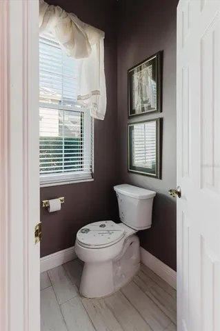 a view of a backyard with table and chairs