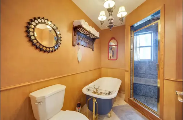 a very nice looking dining room with a large mirror
