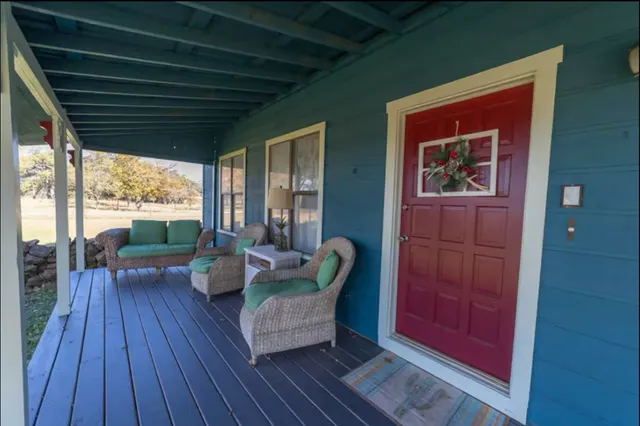 a view of swimming pool with outdoor seating
