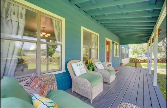 a view of a yard with an outdoor space