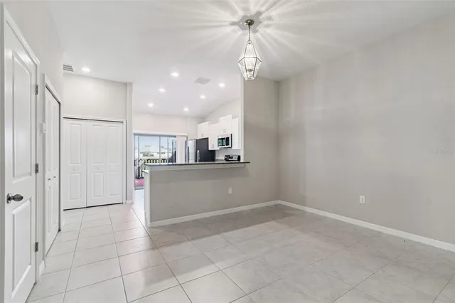 a view of a kitchen with windows