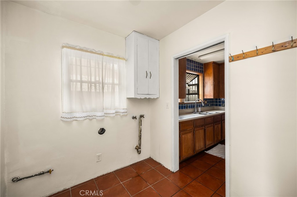 9085 Remick Avenue Arleta, CA 91331 - Photo 26 of 48 Laundry room off of kitchen and primary bedroom