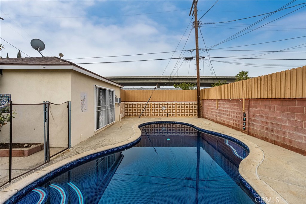 9085 Remick Avenue Arleta, CA 91331 - Photo 3 of 48 Beautiful fenced pool and garage/ADU