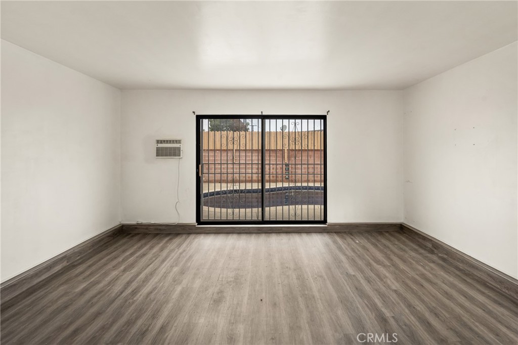 9085 Remick Avenue Arleta, CA 91331 - Photo 41 of 48 Converted garage with view, wall AC unit and slider to pool