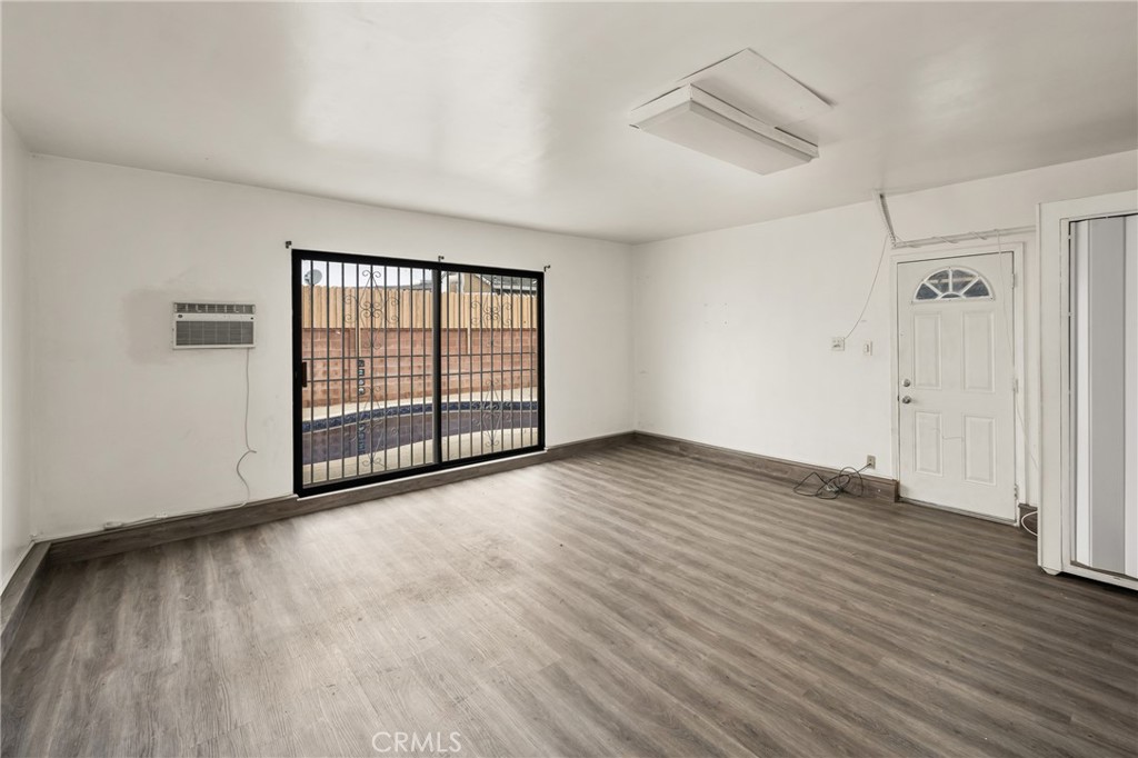 9085 Remick Avenue Arleta, CA 91331 - Photo 42 of 48 Converted garage with view, wall AC unit and slider to pool