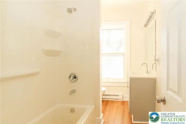 a bathroom with a bathtub