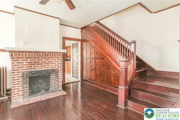 a view of entryway with wooden floor