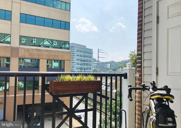 a view of a balcony with chairs