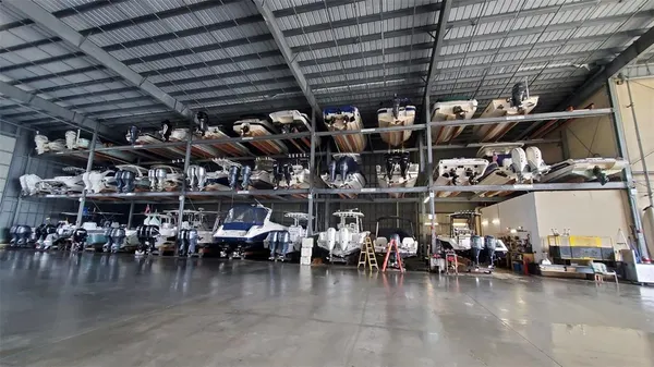 a view of a storage room with lots of racks