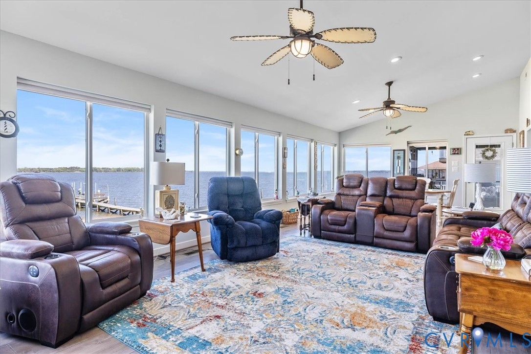 683 Villa Road Claremont, VA 23881 - Photo 1 of 28 a living room with furniture ceiling fan and a rug