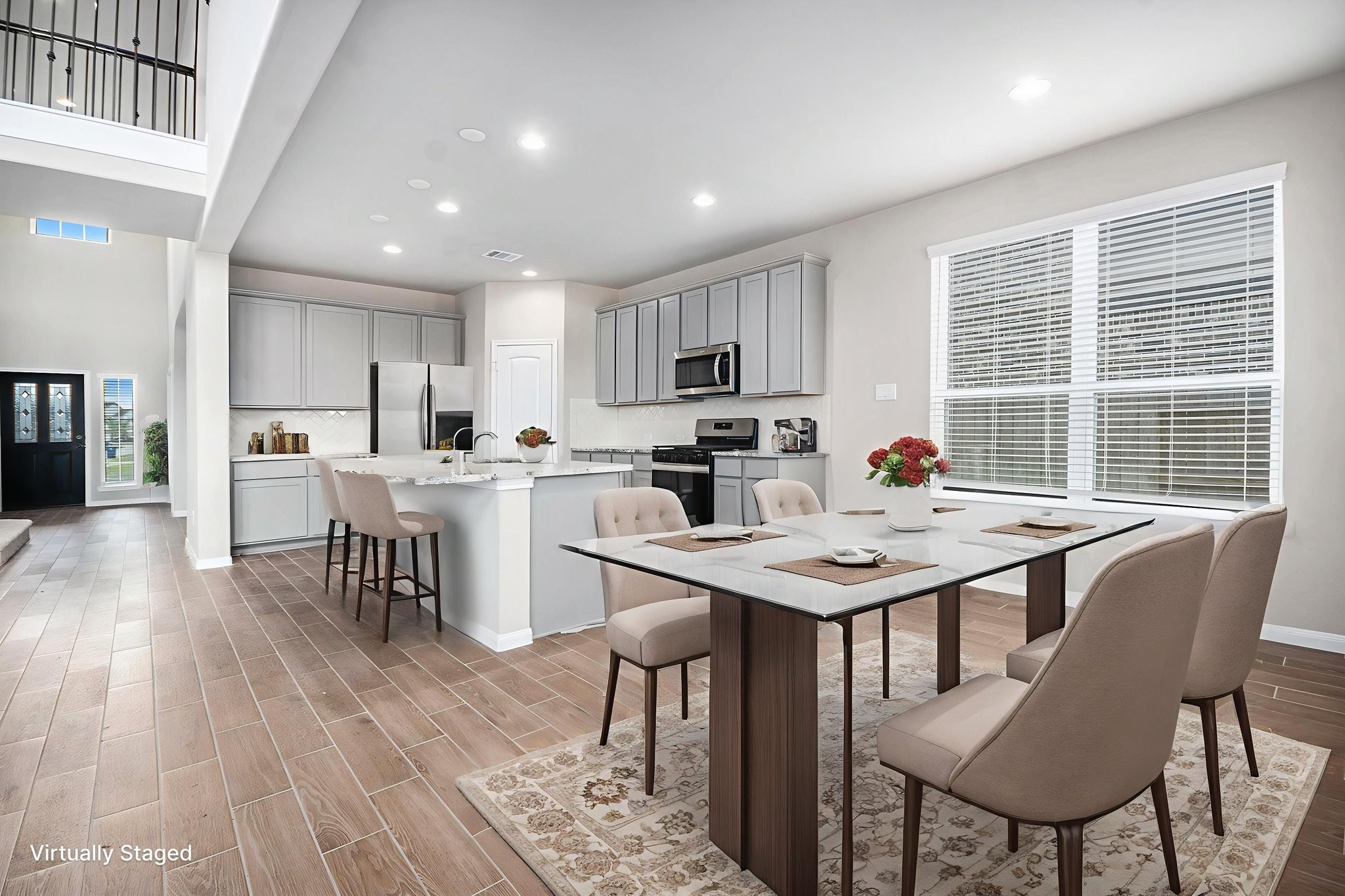 25 Carmel Drive Manvel, TX 77578 - Photo 14 of 50 a view of a dining room with furniture and wooden floor