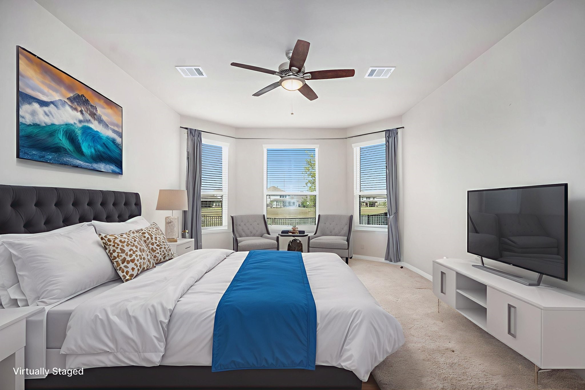 25 Carmel Drive Manvel, TX 77578 - Photo 19 of 50 a bedroom with a bed and a flat screen tv