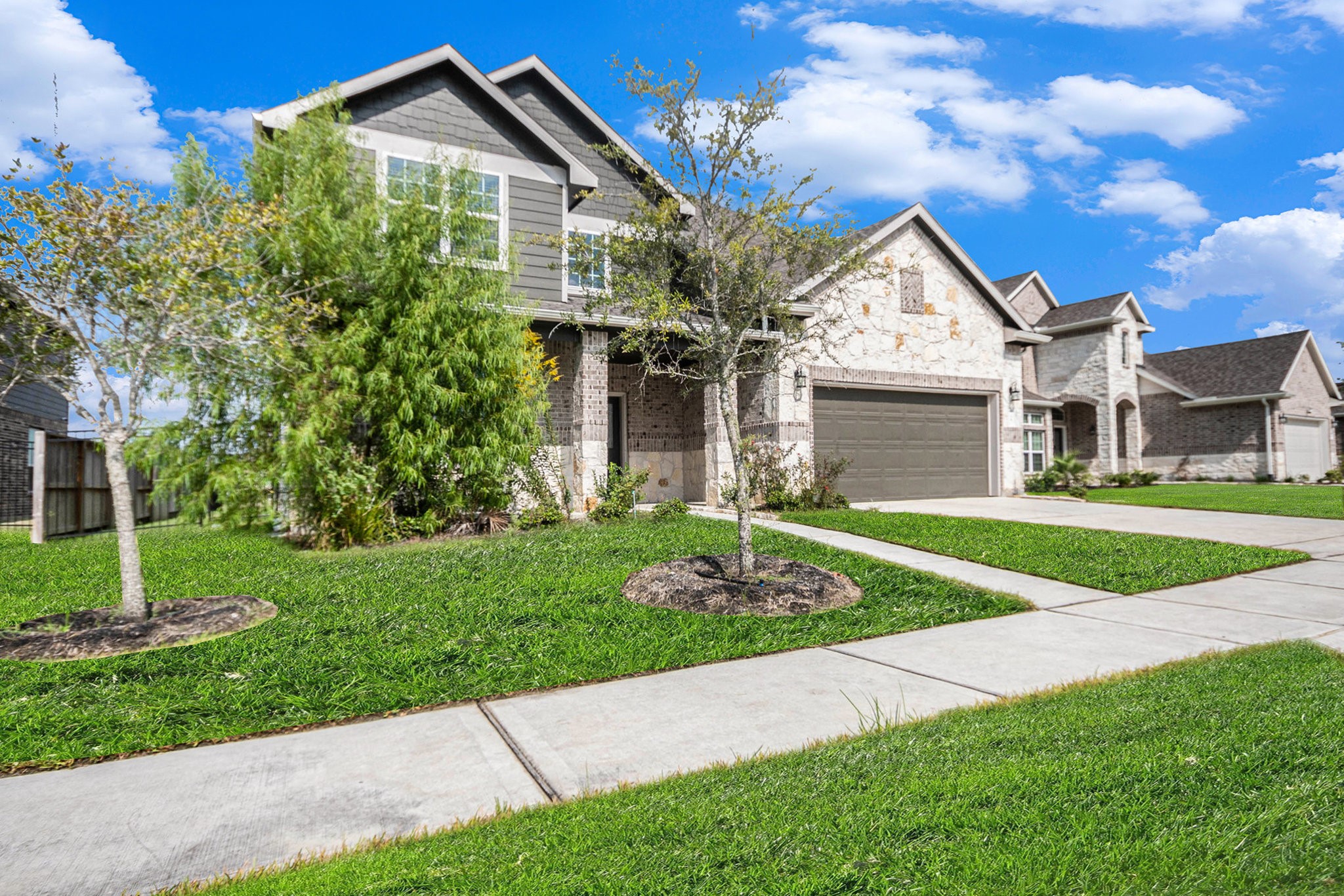 25 Carmel Drive Manvel, TX 77578 - Photo 37 of 50 a front view of a house with a yard