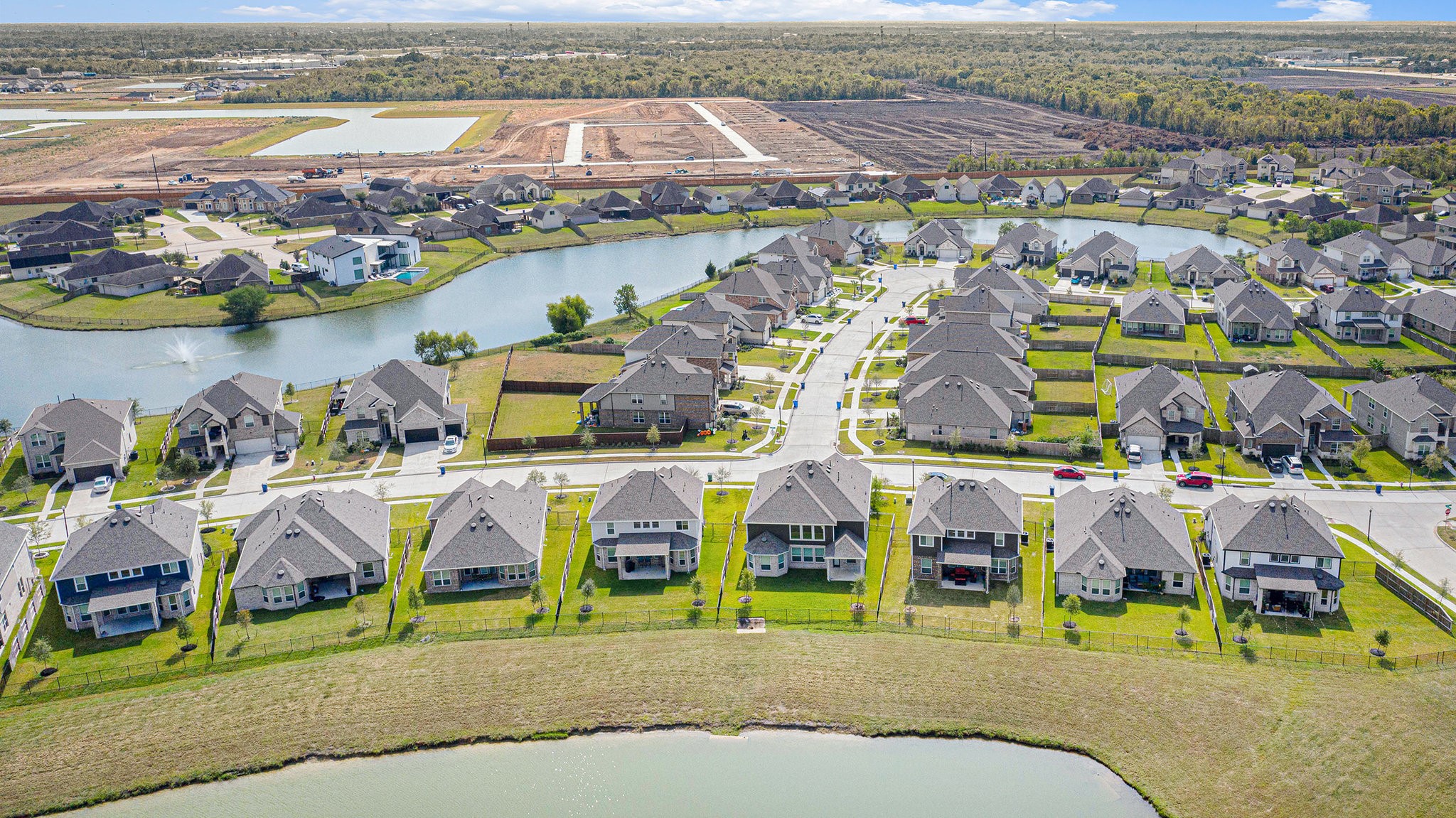 25 Carmel Drive Manvel, TX 77578 - Photo 40 of 50 an aerial view of residential houses with outdoor space and ocean view
