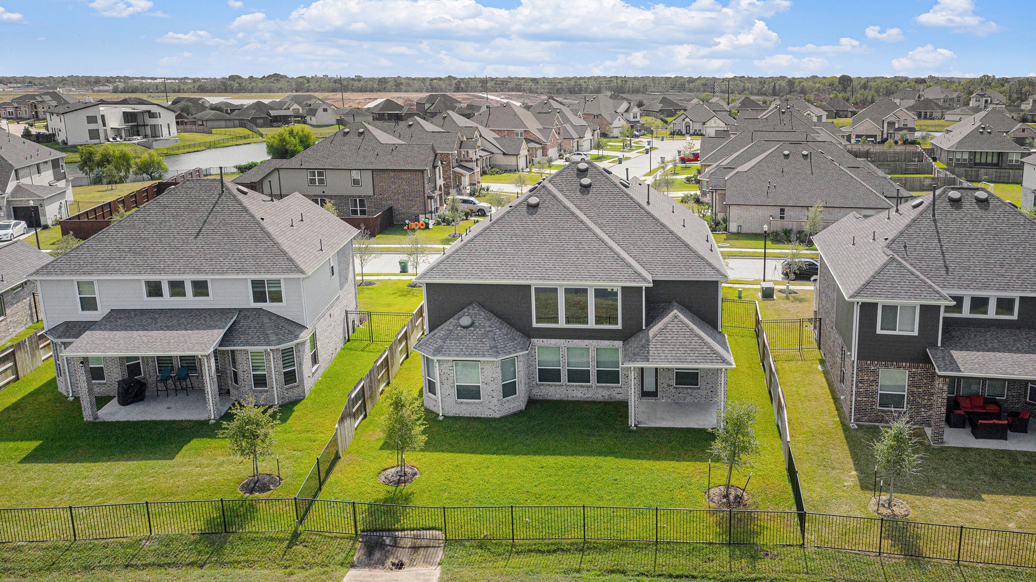 25 Carmel Drive Manvel, TX 77578 - Photo 41 of 50 an aerial view of a house with swimming pool