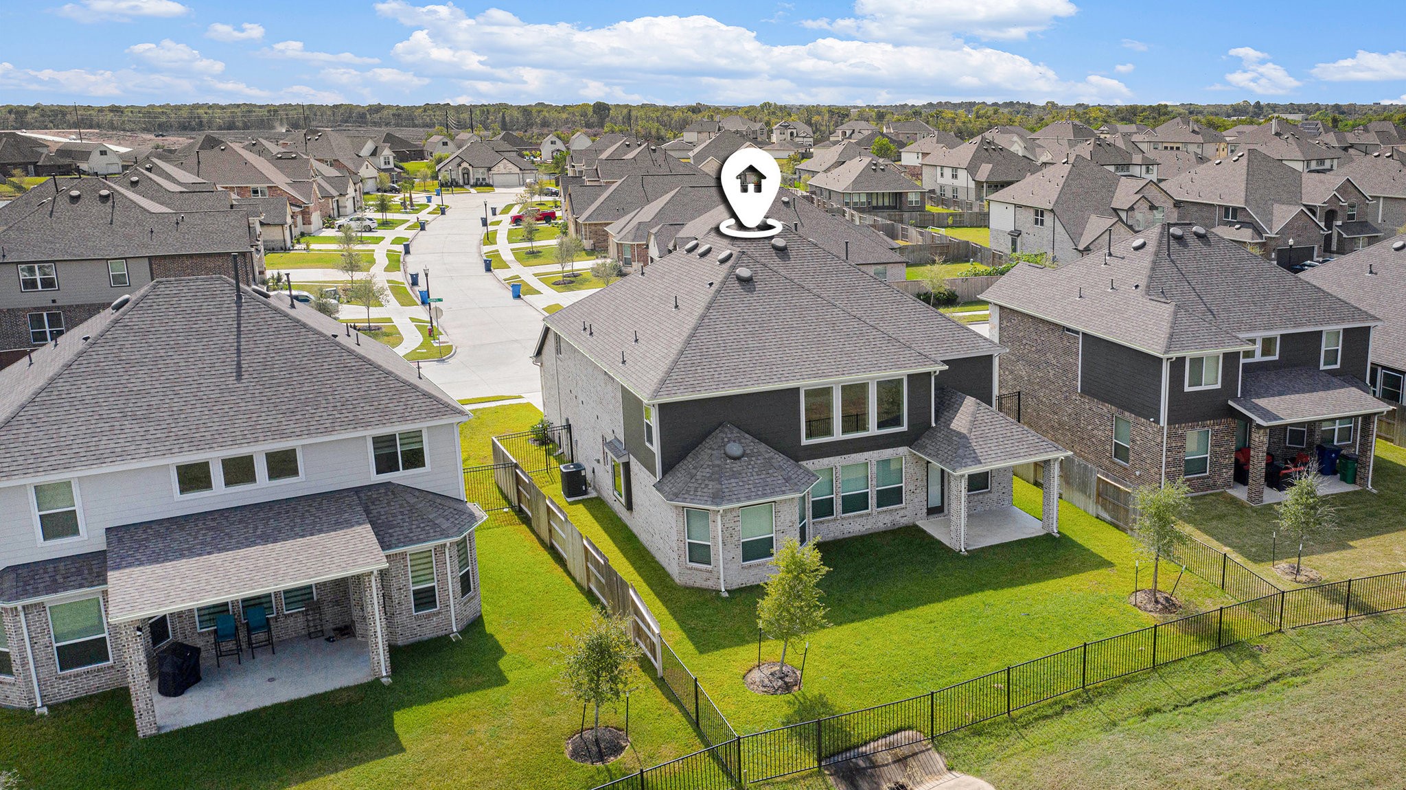 25 Carmel Drive Manvel, TX 77578 - Photo 45 of 50 an aerial view of a house with swimming pool and large trees