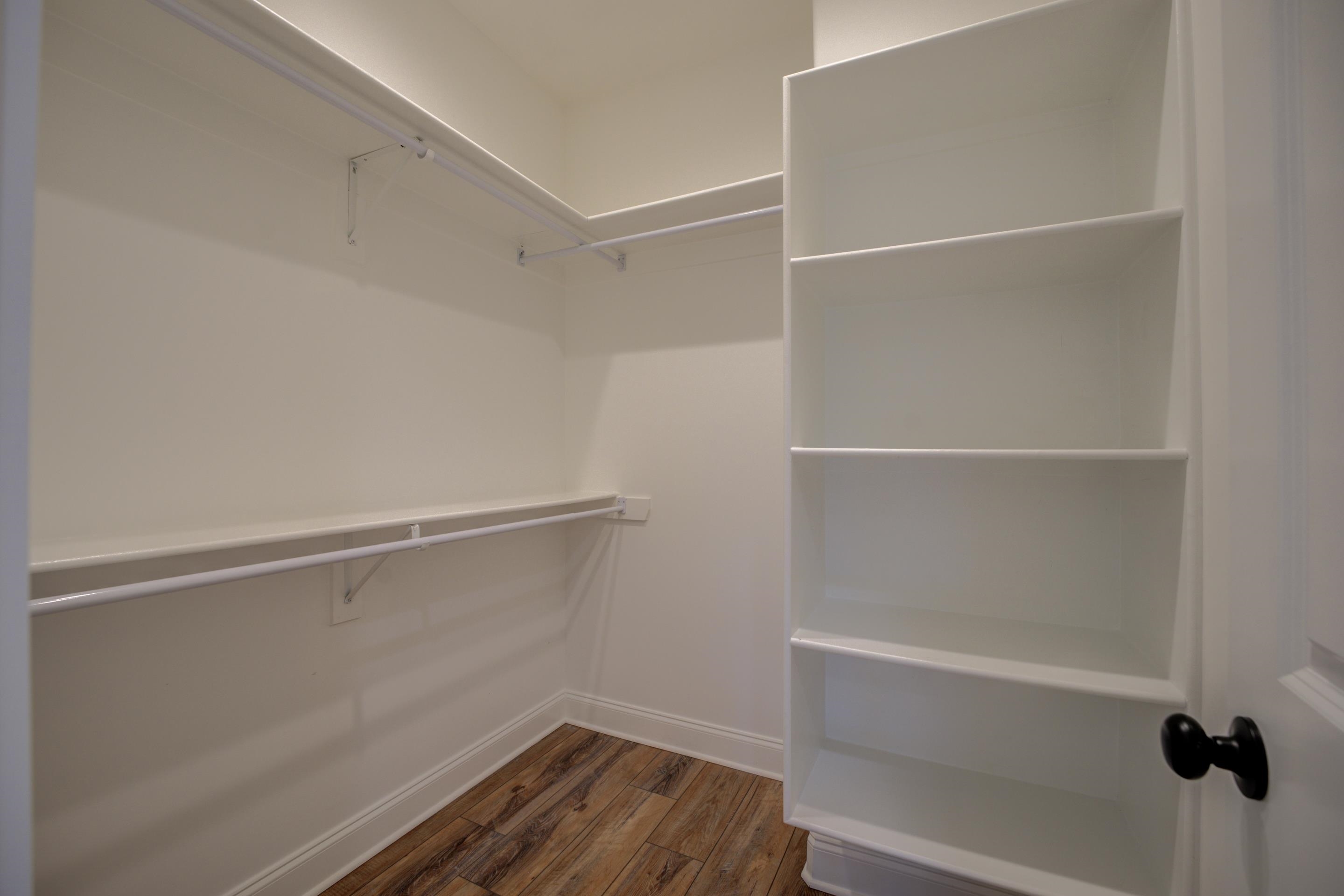1373 Belfair Drive Collierville, TN 38017 - Photo 20 of 24 a view of walk in closet with empty racks