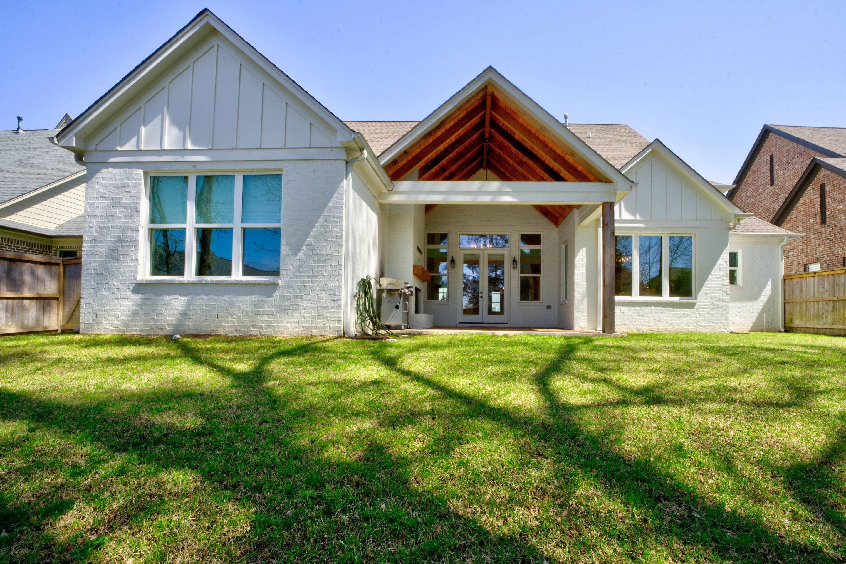 1373 Belfair Drive Collierville, TN 38017 - Photo 21 of 24 a front view of a house with a yard