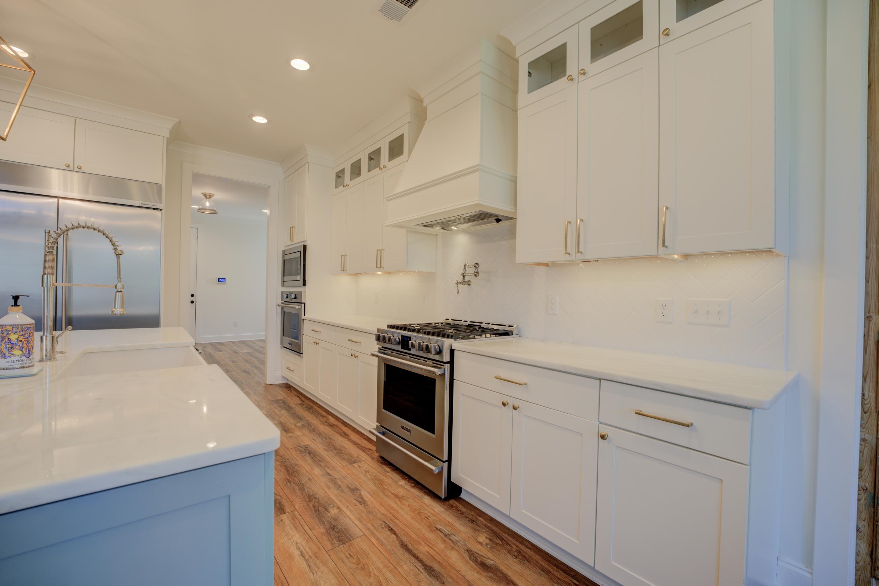1373 Belfair Drive Collierville, TN 38017 - Photo 8 of 24 a kitchen with stainless steel appliances granite countertop a sink and cabinets