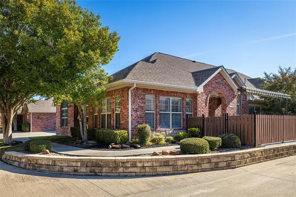 front view of house with a small yard
