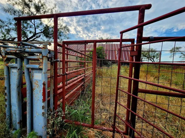 a view of swimming pool with outdoor seating