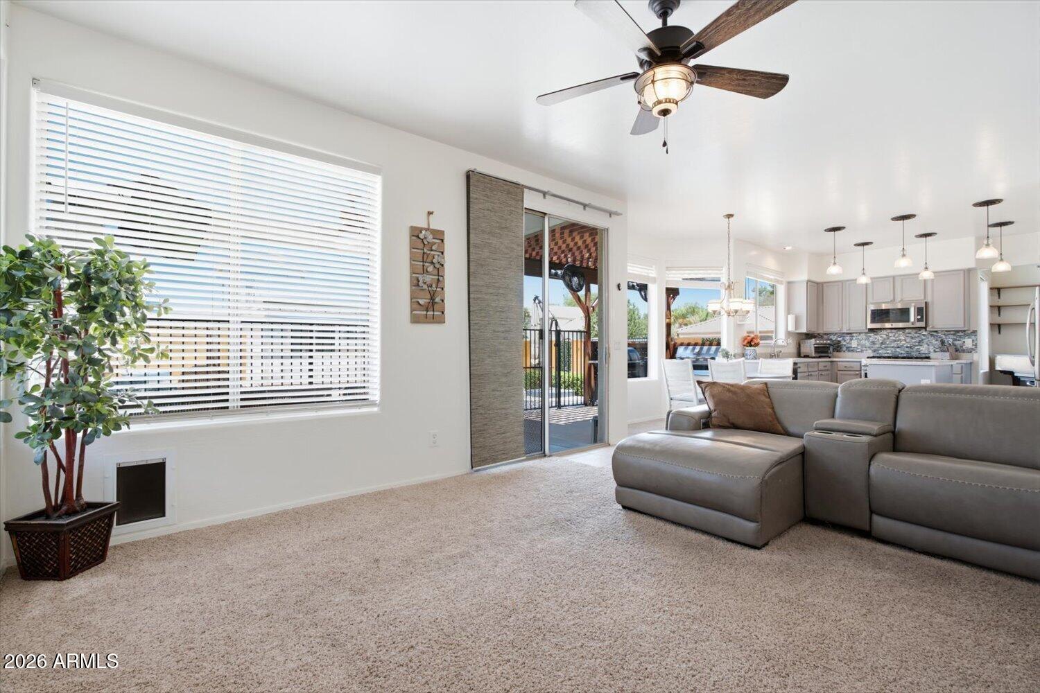 1894 East Mineral Road Gilbert, AZ 85234 - Photo 14 of 48 a living room with furniture and a potted plant