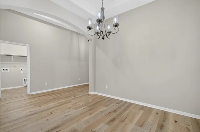 wooden floor in a hall with an entryway