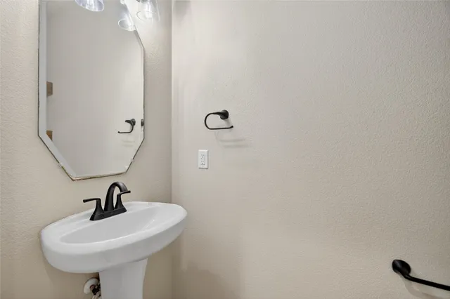 a sink with a mirror