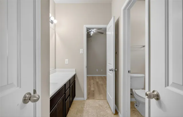 a bathroom with a double vanity sink and mirror