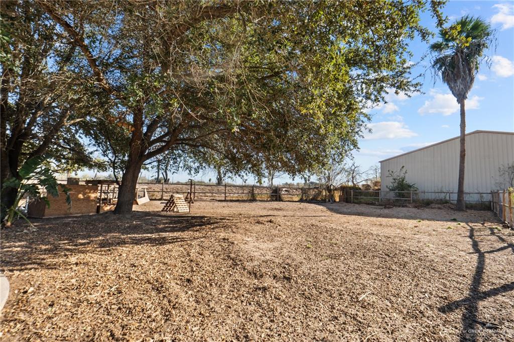 2300 Coby Drive Mission, TX 78574 - Photo 20 of 27 a view of a yard with a tree