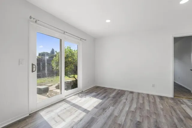 a view of an empty room and window