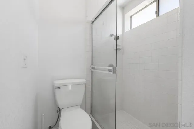 a bathroom with a toilet