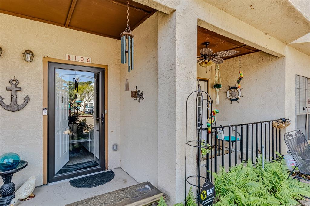 1933 Island Circle, Unit B106 Tool, TX 75143 - Photo 2 of 12 a view of a front door and wooden floor