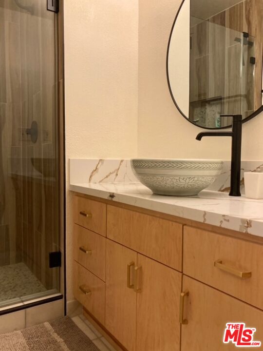 7740 Redlands Street, Unit G1098 Playa del Rey, CA 90293 - Photo 14 of 35 a bathroom with a sink and a mirror
